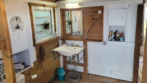 Salle de bain et toilettes partagés